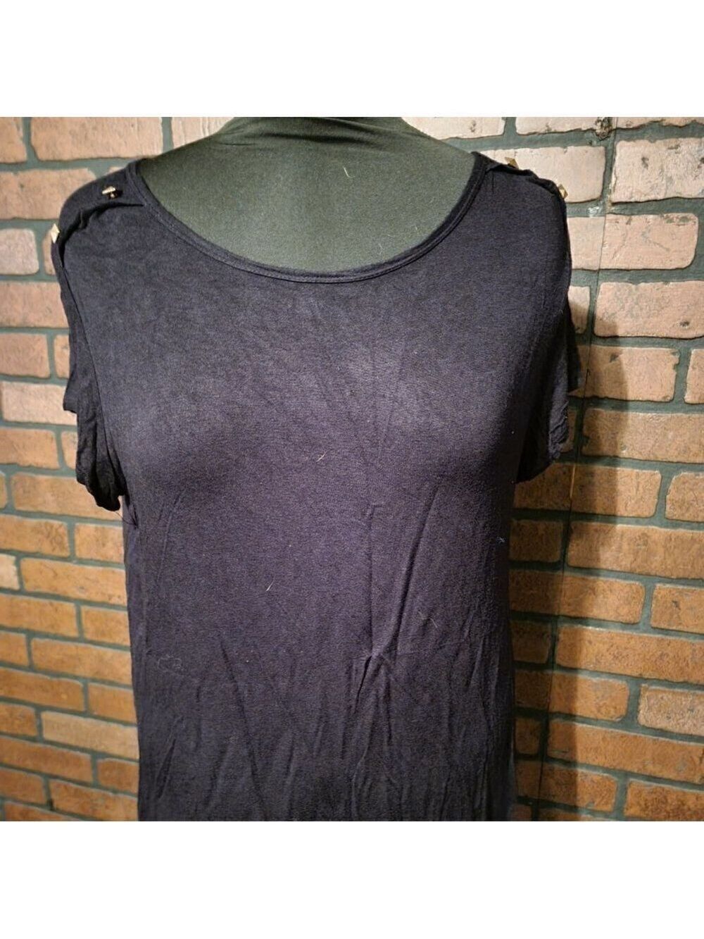 Claudia Richard Black with Chevron inset back design. Size Large